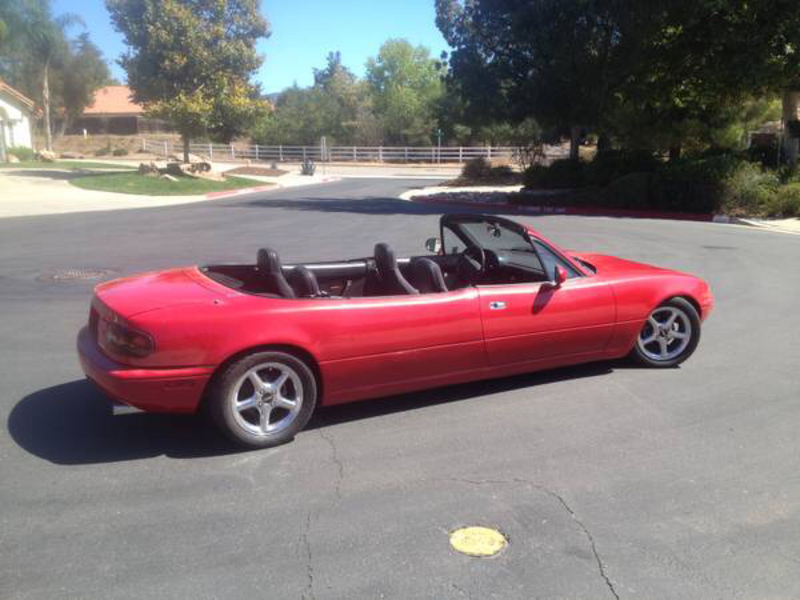 Illustration for article titled What four door sedan/salooooon car is most like a 4 door Integra/Miata?